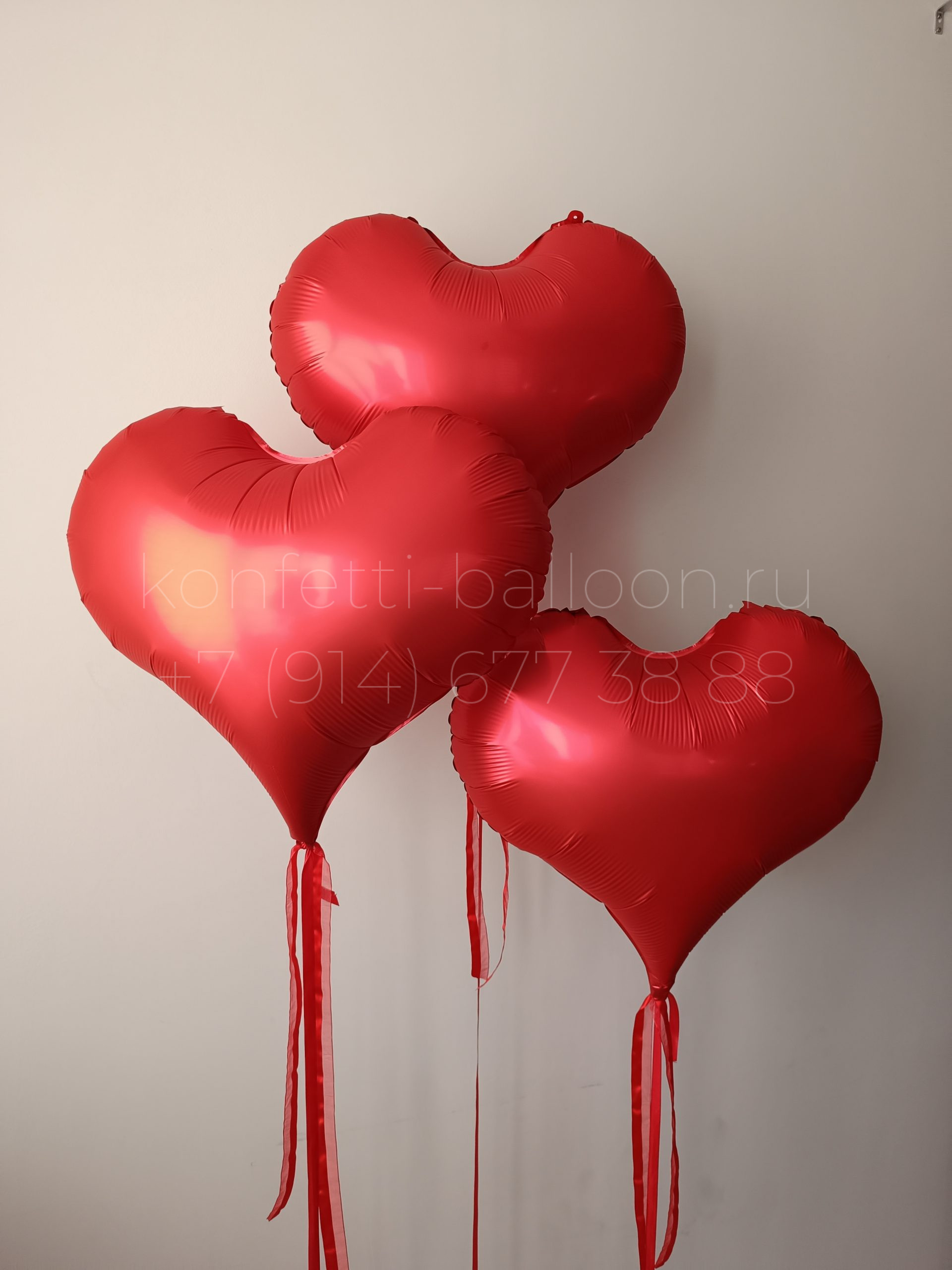 Композиция из гелиевых шаров фольгированные сердца