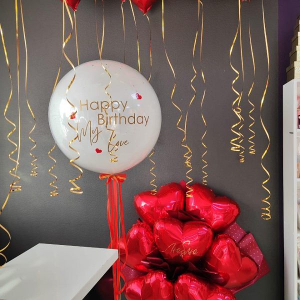 Композиция из гелиевых шаров и крафтовый букет